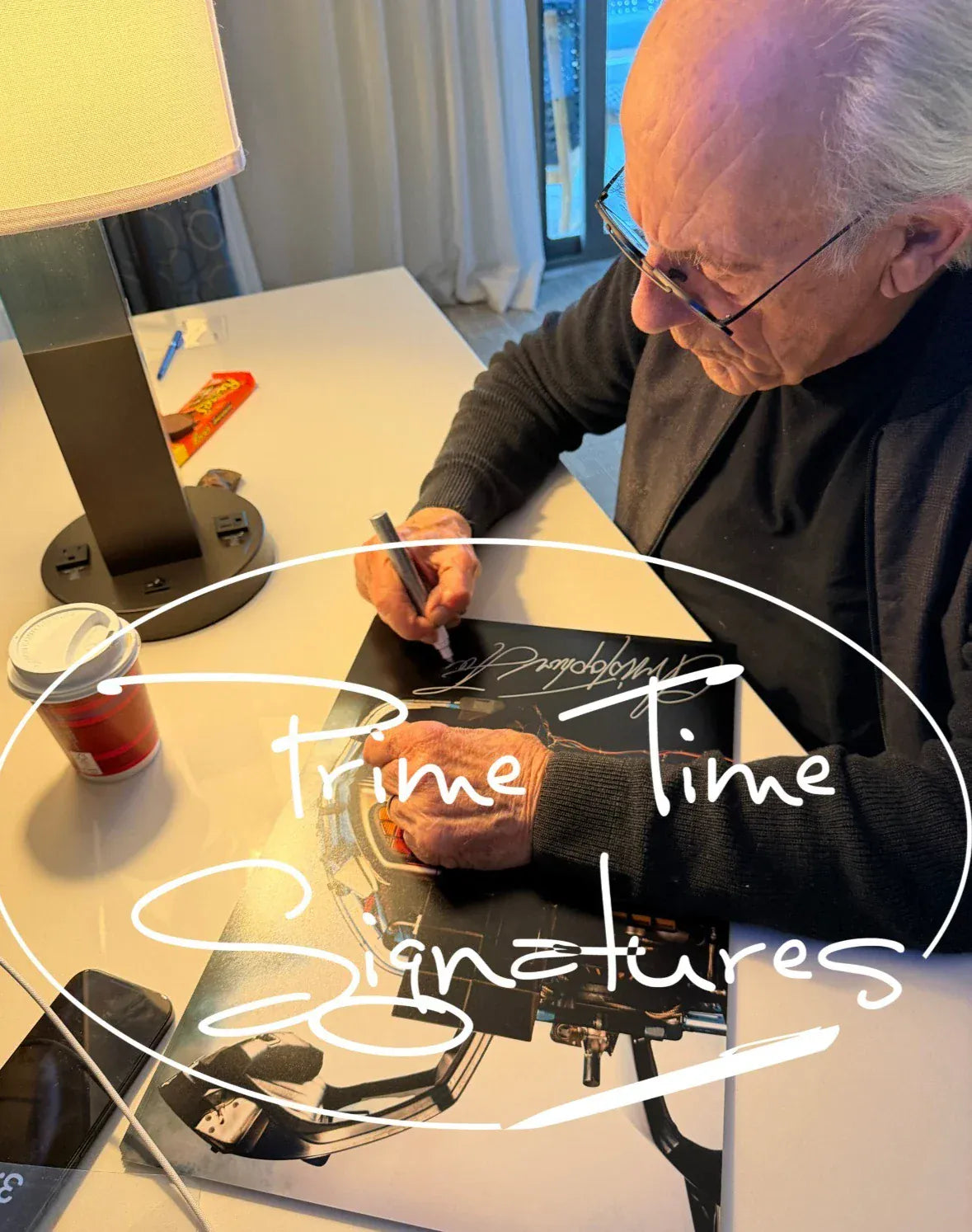 Christopher Lloyd signing autograph in person — Prime Time Signatures