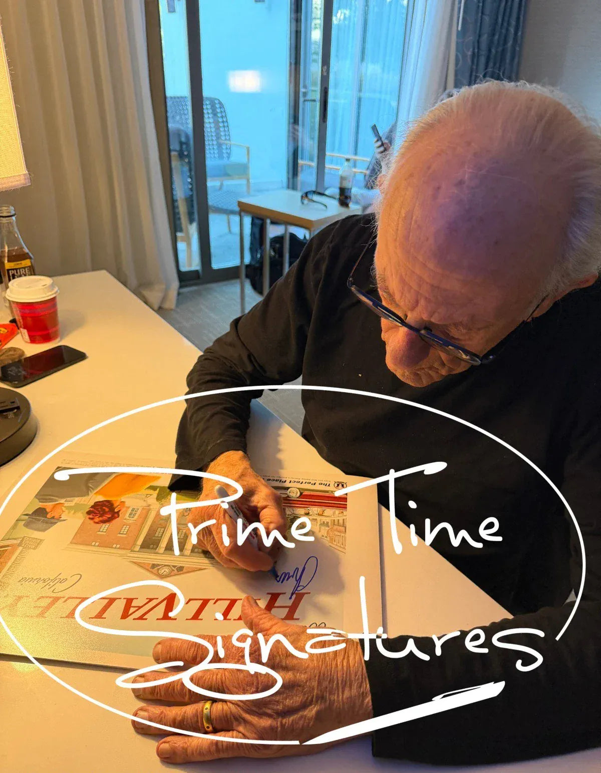 Christopher Lloyd signing autograph in person — Prime Time Signatures