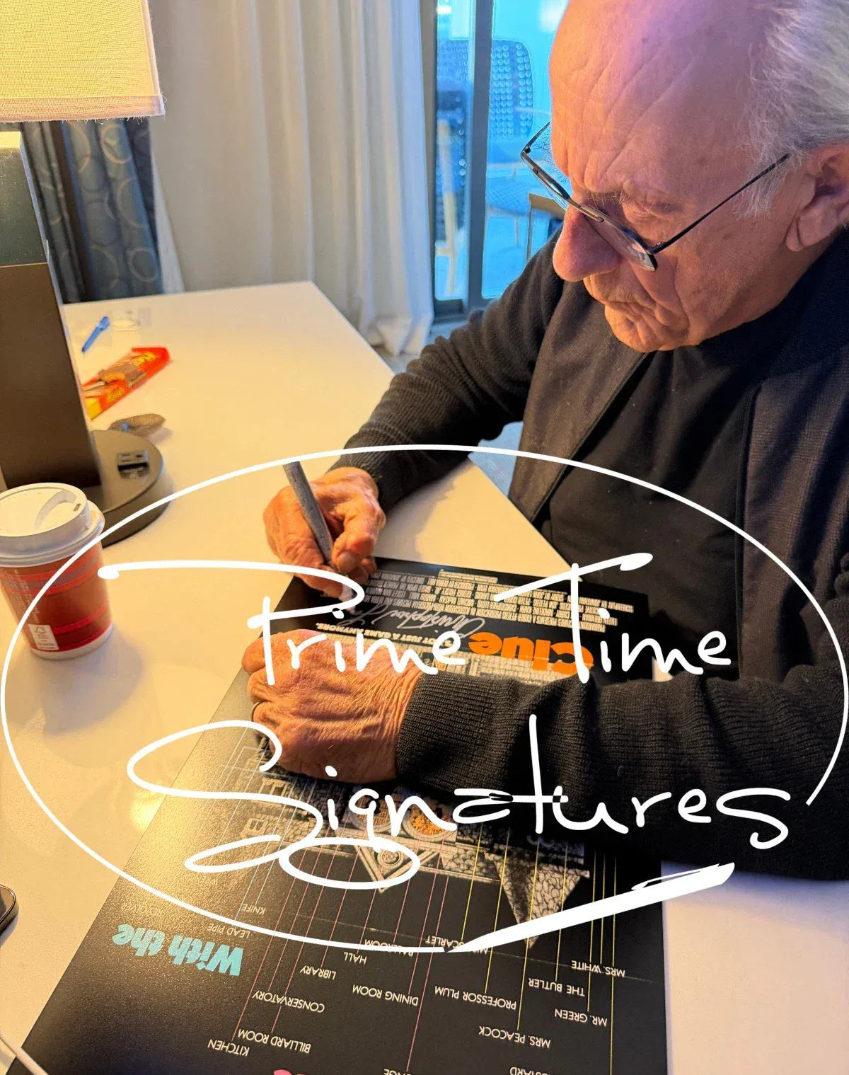 Christopher Lloyd signing autograph in person — Prime Time Signatures