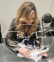 Denise Richards signing autograph in person — Prime Time Signatures