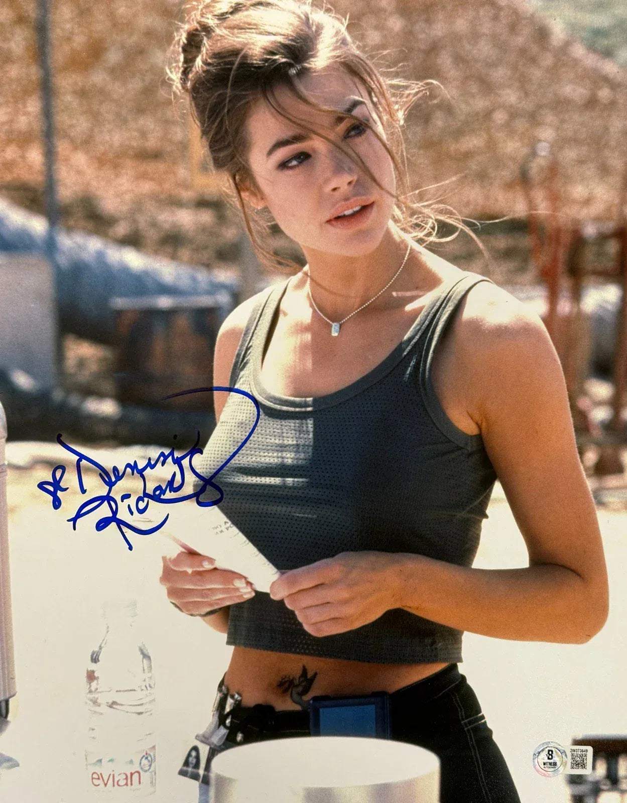 Denise Richards signed James Bond The World Is Not Enough 11x14 photo — Beckett Witness