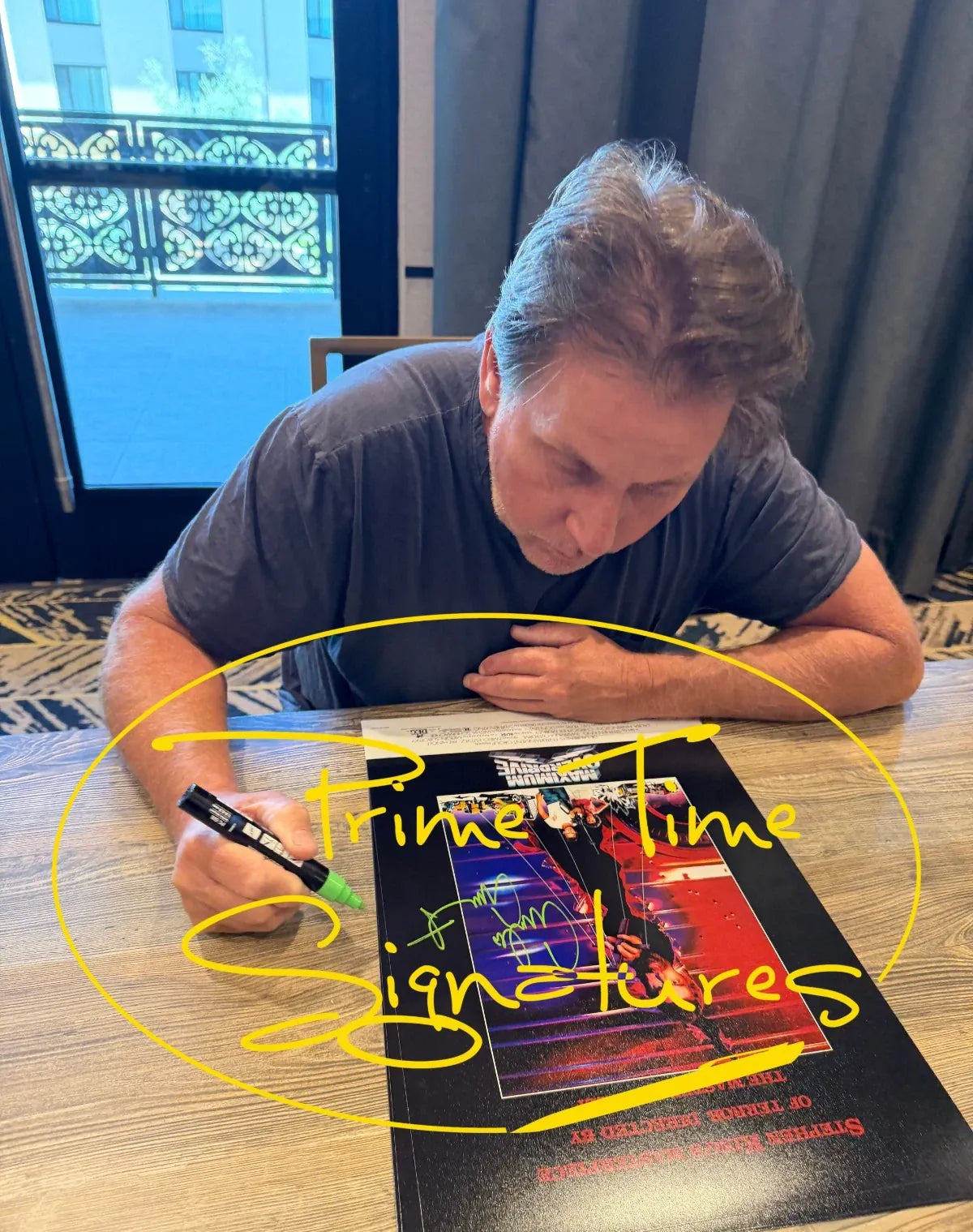Emilio Estevez Authentic Autographed Maximum Overdrive 12x18 Photo - being signed in person