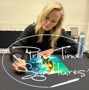 Malin Akerman signing autograph in person — Prime Time Signatures