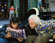 Michael J. Fox and Christopher Lloyd dual-signed Back to the Future 11x14 photo — PSA/DNA LOA