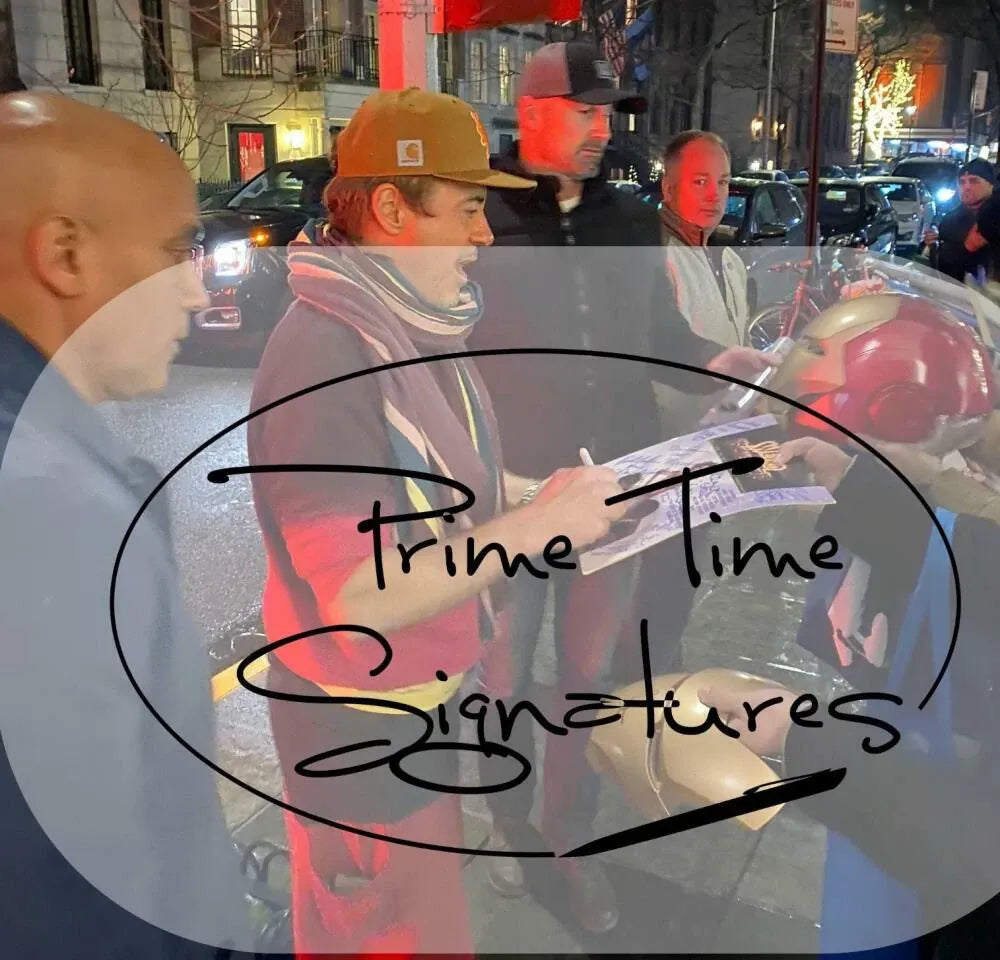 Robert Downey Jr. signing autograph in person