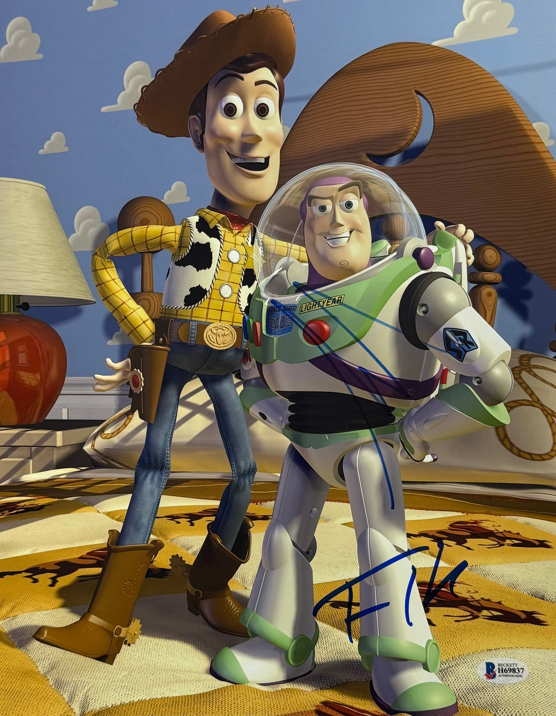 Buzz Lightyear and Woody 11x14 Toy Story photo signed by Tim Allen and Tom Hanks — dual-signed — Beckett hologram authenticated