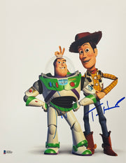 Tom Hanks and Tim Allen dual-signed 11x14 Toy Story photo — Woody and Buzz voice actors — Beckett hologram COA