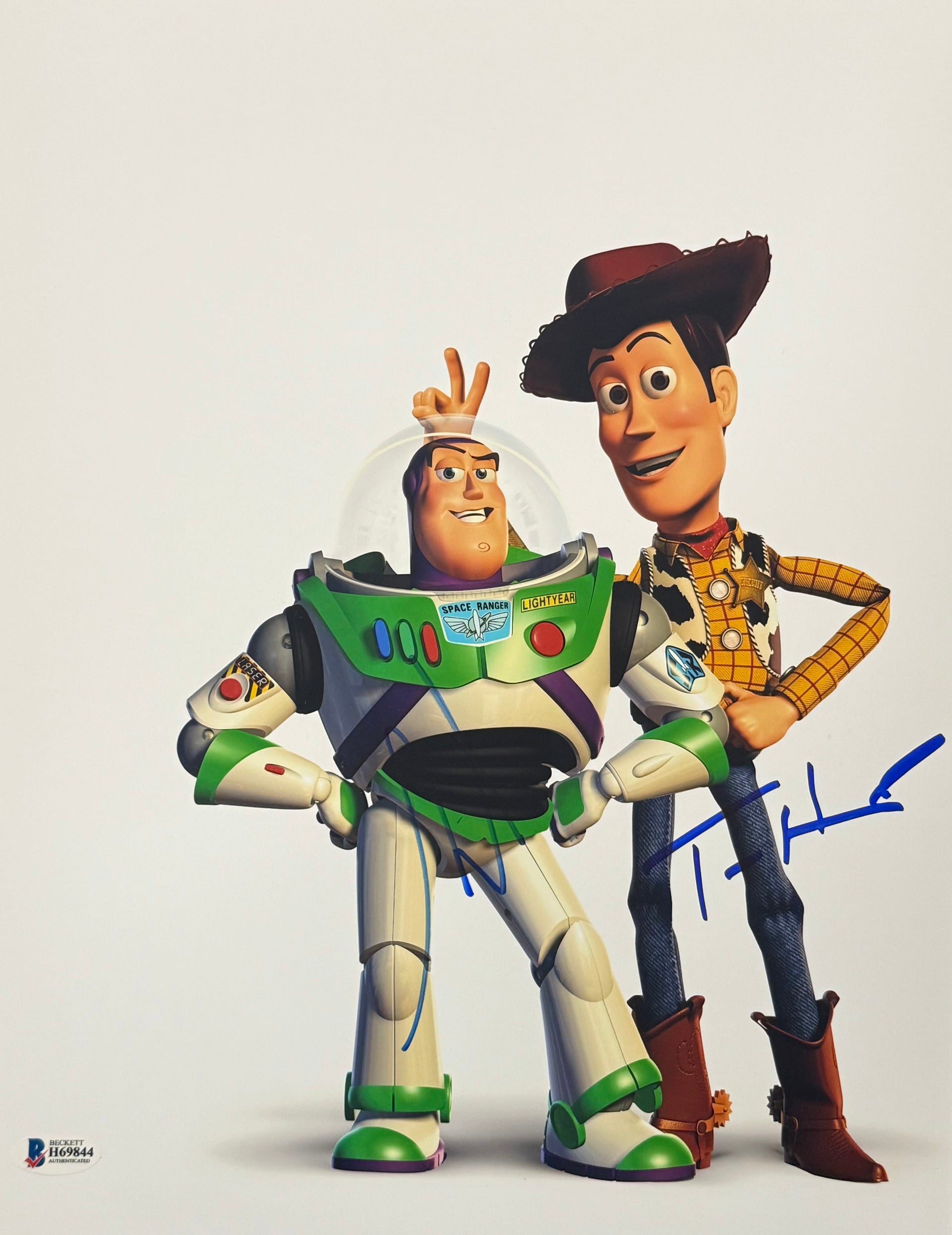 Tom Hanks and Tim Allen dual-signed 11x14 Toy Story photo — Woody and Buzz voice actors — Beckett hologram COA
