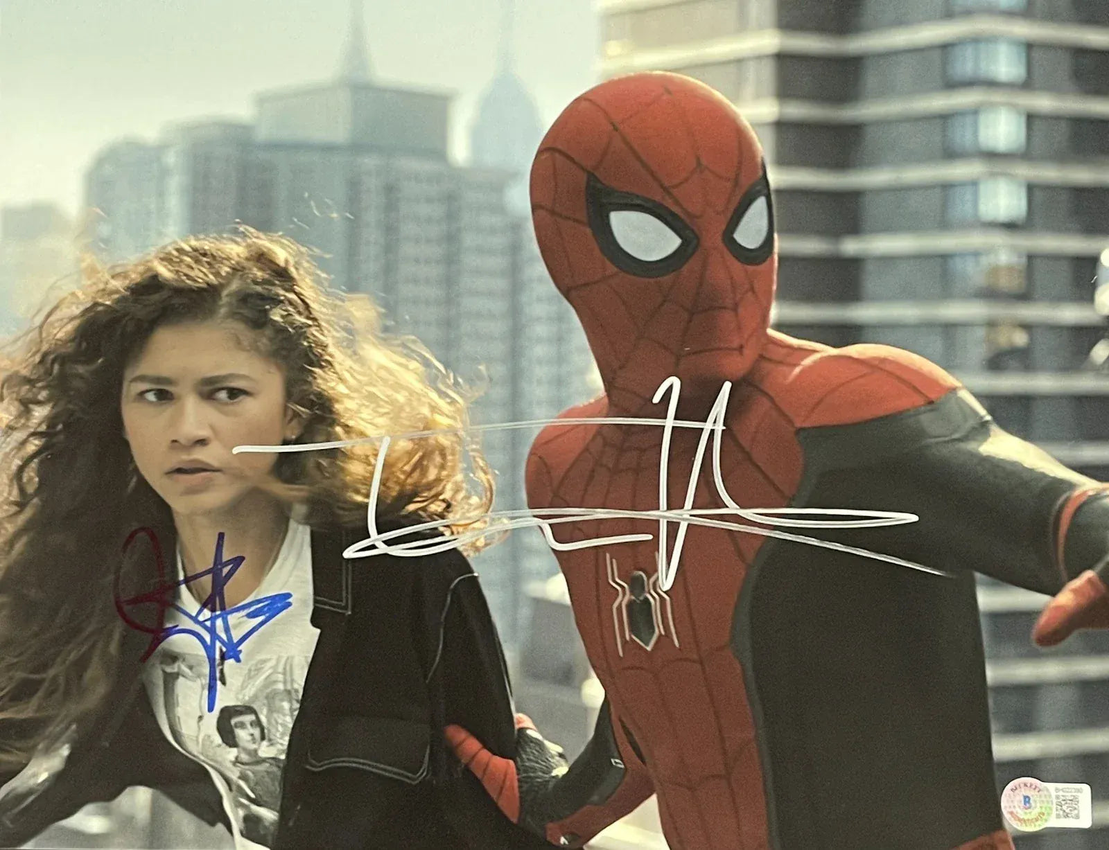 Tom Holland and Zendaya dual-signed Spider-Man 11x14 photo — Beckett authenticated