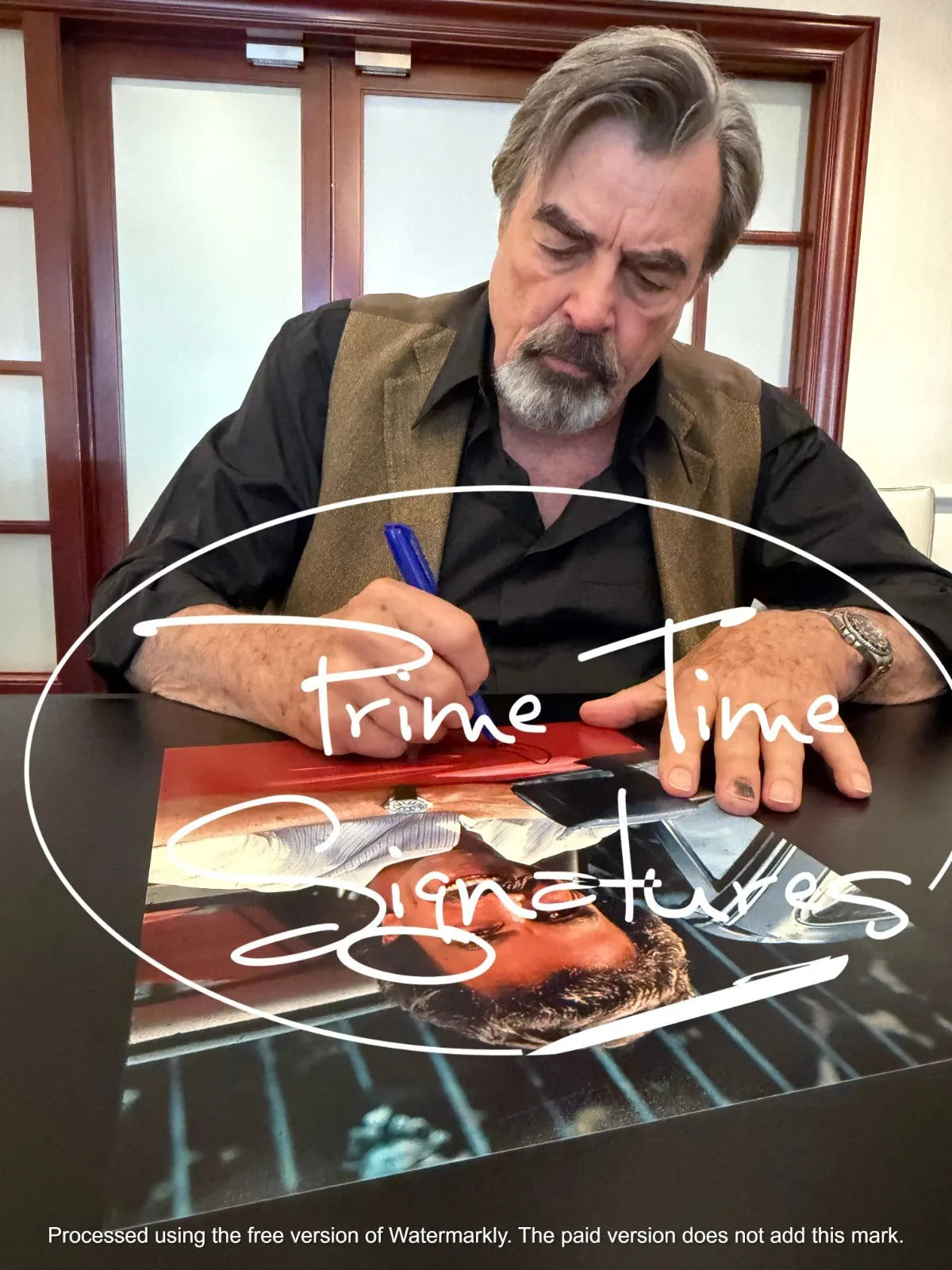 Tom Selleck signing autograph in person