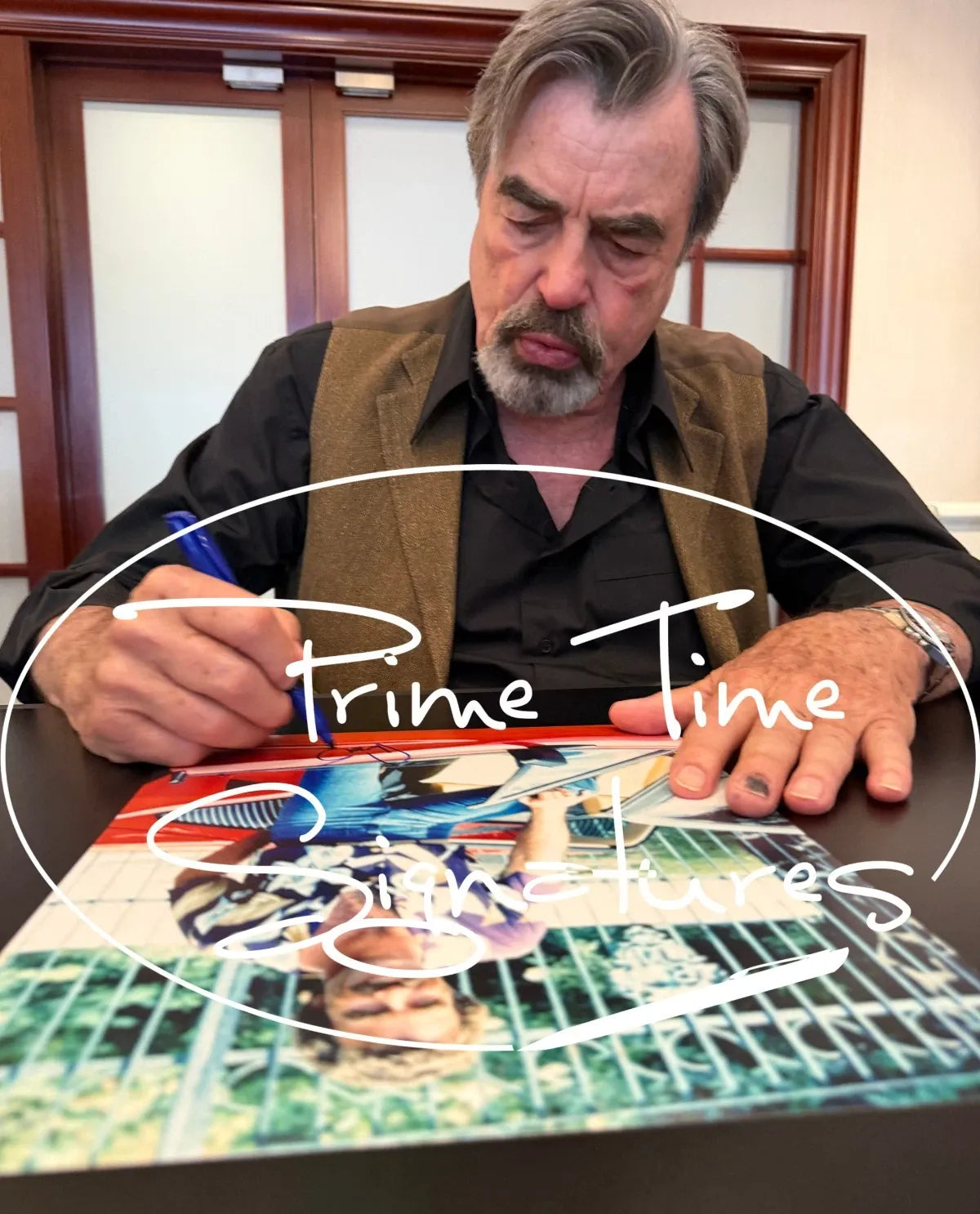 Tom Selleck signing autograph in person