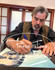 Tom Selleck signing autograph in person
