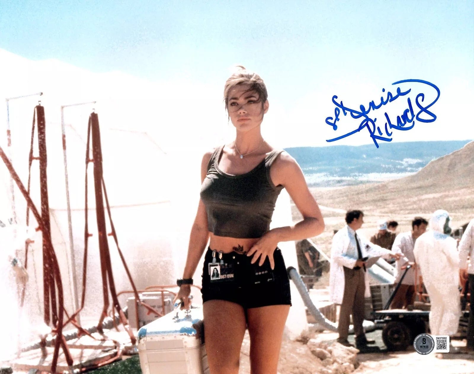 Denise Richards Signed 11x14 Photo from James Bond Beckett COA - Item #3